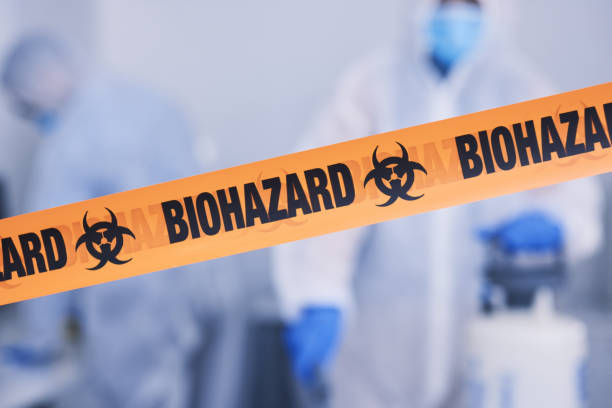 Professional Biohazard Cleanup technician working in Weymouth, MA